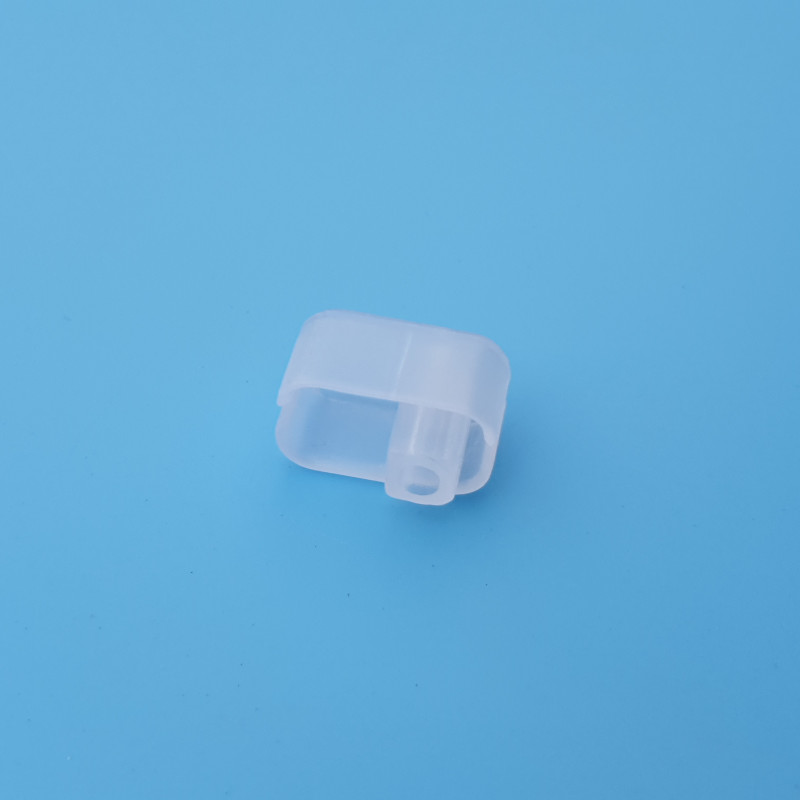 Wrap-around weight cap colorless
